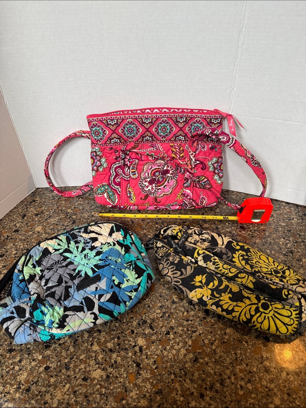 Vera Bradley Quilted Pink Patterned Tote Bag and two cosmetic bags.